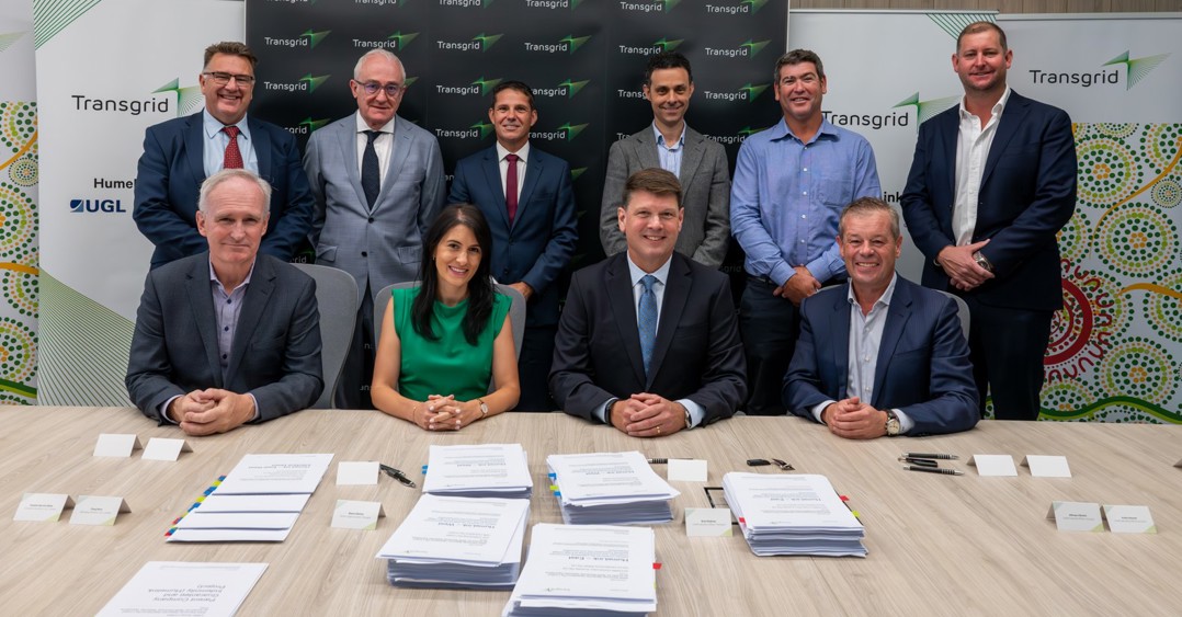 Transgrid CEO and the HumeLink delivery partners sign the contracts in Sydney today