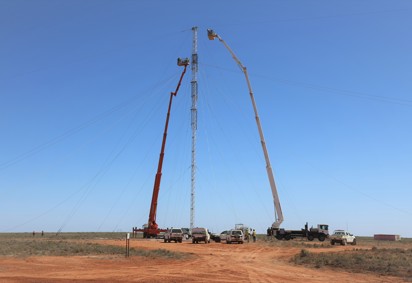 Conductor stringing works are carried out on emergency towers installed near Broken Hill last year