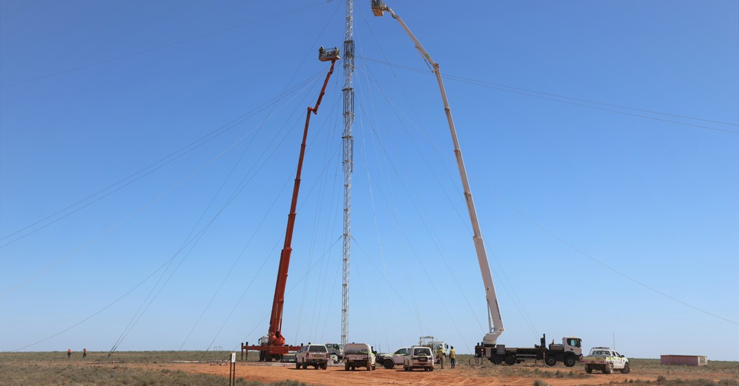 Conductor stringing works are carried out on emergency towers installed near Broken Hill last year