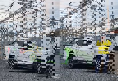 Anthony Madani with Electric UTE